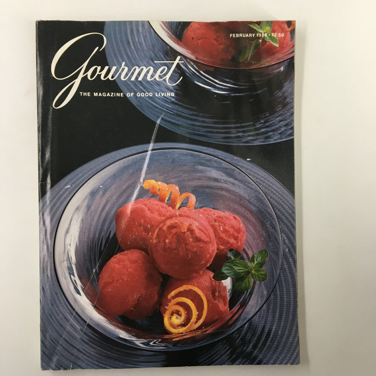 Cover of VTG Gourmet Magazine February 1988 featuring vibrant red dessert sorbet in clear bowls, showcasing culinary creativity.