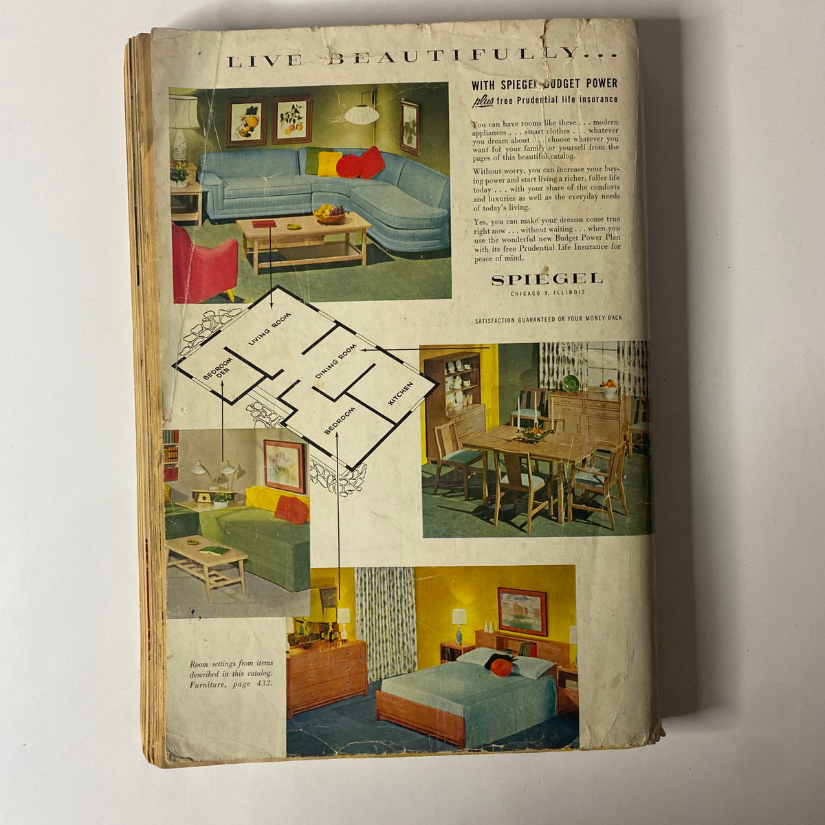 Back cover of the 1955 Spiegel Fall and Winter Catalog, featuring home interior layouts and decor suggestions, emphasizing the principles of modern living in mid-century America.