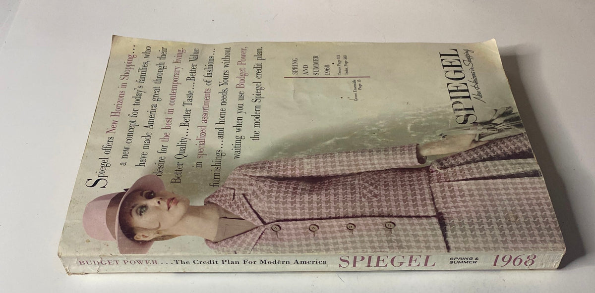 Side view of the 1968 Spiegel Spring and Summer Catalog cover showcasing a model in a pink chevron outfit, highlighting contemporary shopping options.