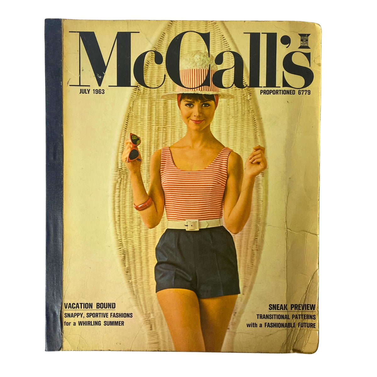 Cover of the 1963 July McCall's Summerwear Catalog, featuring a model in a striped top and shorts against a woven background, showcasing summer fashion styles.