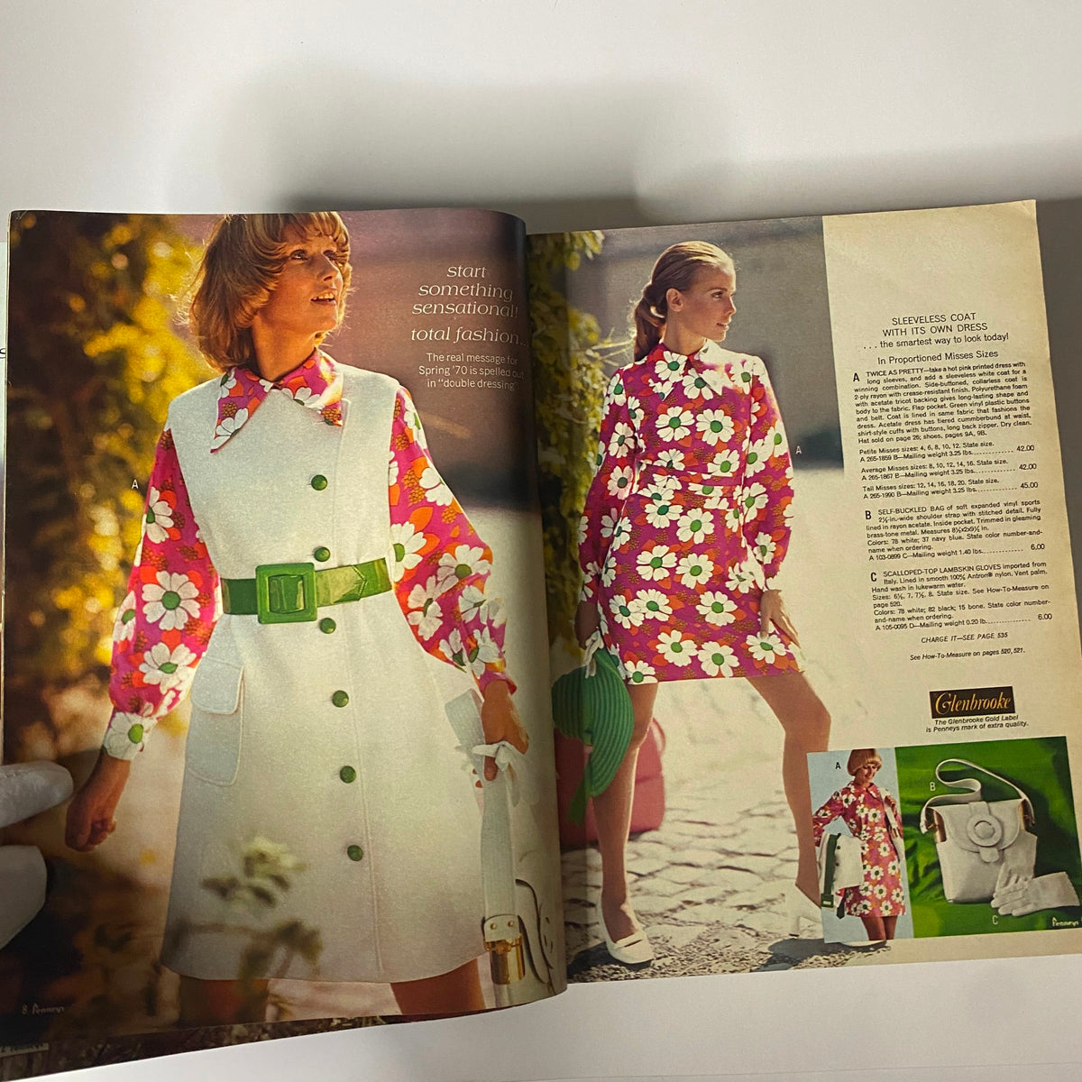 Inside spread of the 1970 JC Penneys Spring and Summer Store Catalog displaying two women in floral outfits, highlighting a fashion advertisement with colorful details.