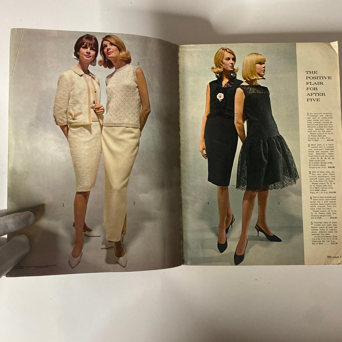 Inside spread of the 1970 Sears Fall and Winter Catalog displaying two models in sophisticated evening wear, highlighting 1970s fashion styles.