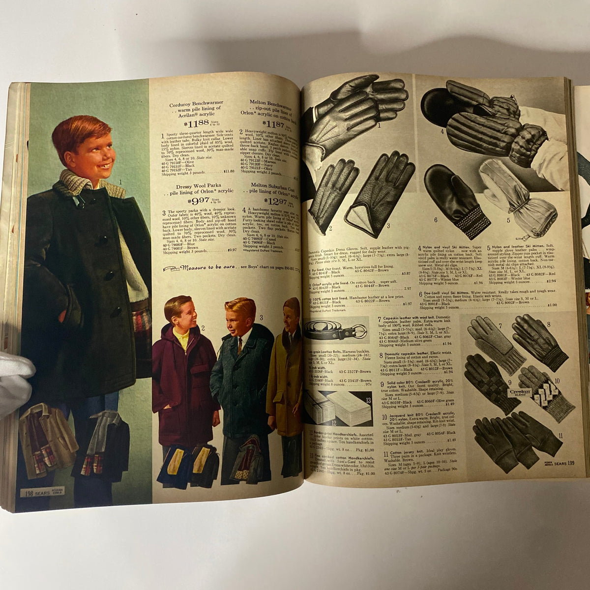 1965 Sears Fall and Winter Catalog presenting outerwear and accessories for boys, including stylish coats and gloves, perfect for winter wear.