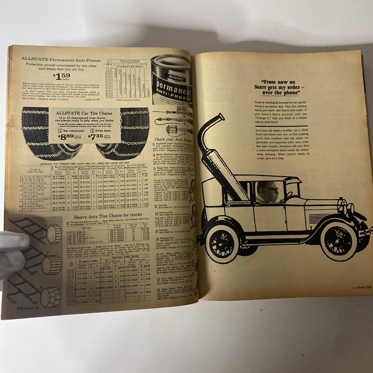 1965 Sears Fall and Winter Catalog open to a page featuring automotive products including Allstate Anti-Freeze and tire chains with pricing information.