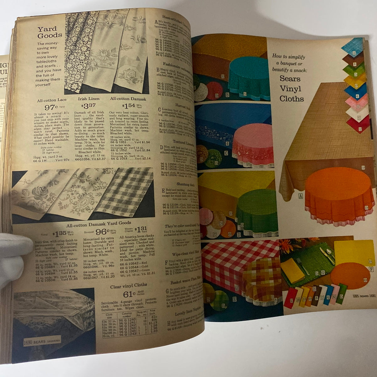 1965 Sears Fall and Winter Catalog featuring a range of yard goods including lace, linen, and vinyl tablecloths for home improvement and decoration.