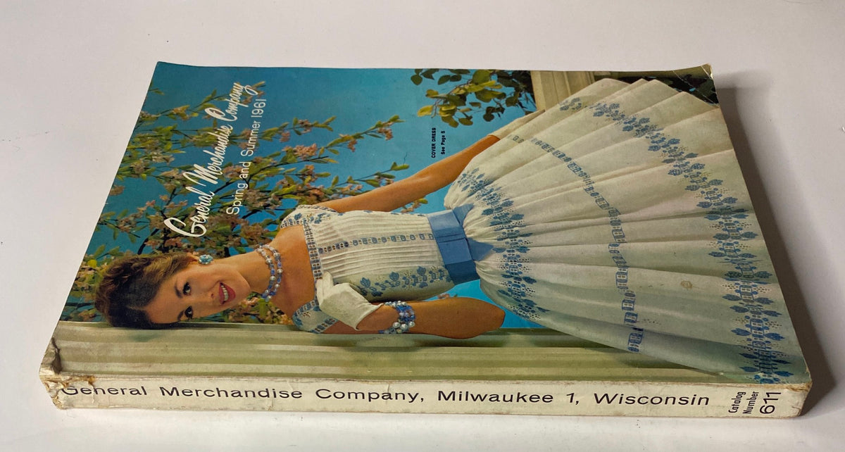 Side view of the 1961 General Merchandise Company Spring and Summer Catalog, highlighting the cover image and details of the vintage publication.