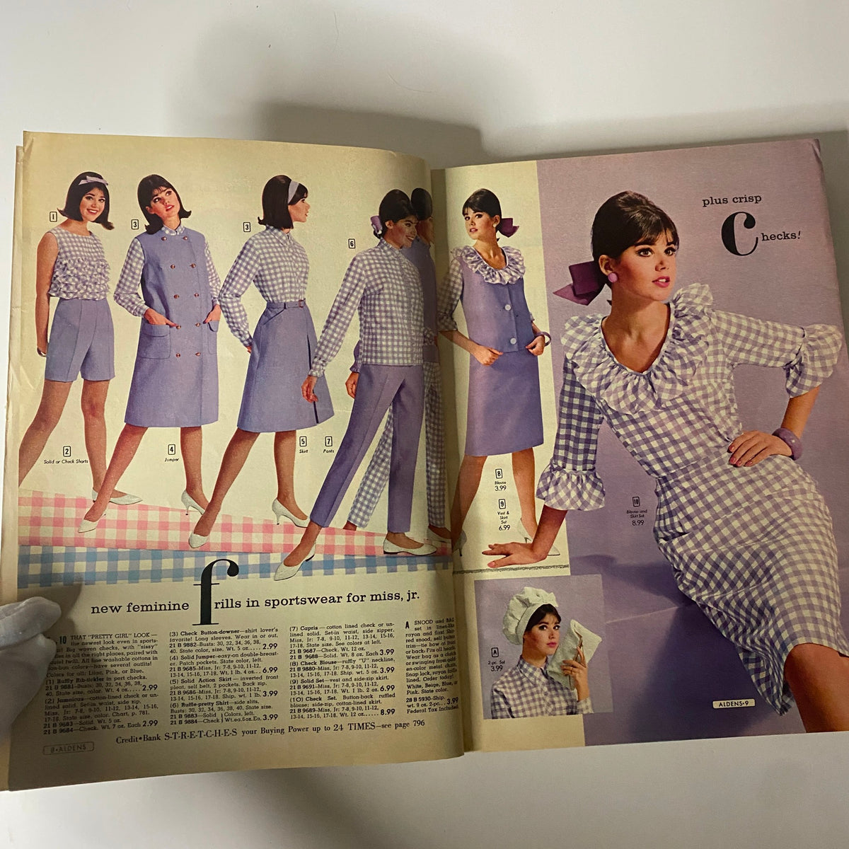 Open pages of the 1965 Aldens Spring and Summer Catalog featuring sportswear for women and girls, showcasing vibrant styles and patterns of the year.