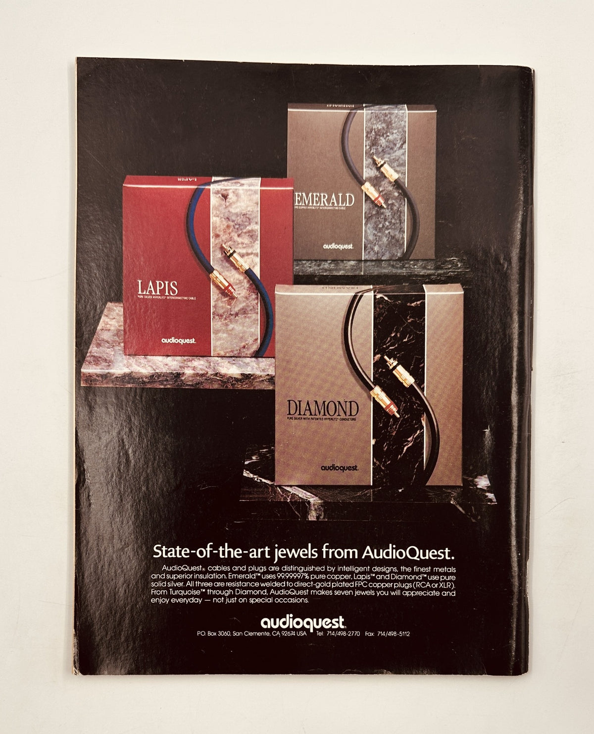 Advertisement for AudioQuest showcasing three product lines: Lapis, Emerald, and Diamond. The image highlights their state-of-the-art designs suitable for high-fidelity audio enthusiasts. Related to the Audio Magazine September 1992 featuring Goddard Lieberson and product reviews.