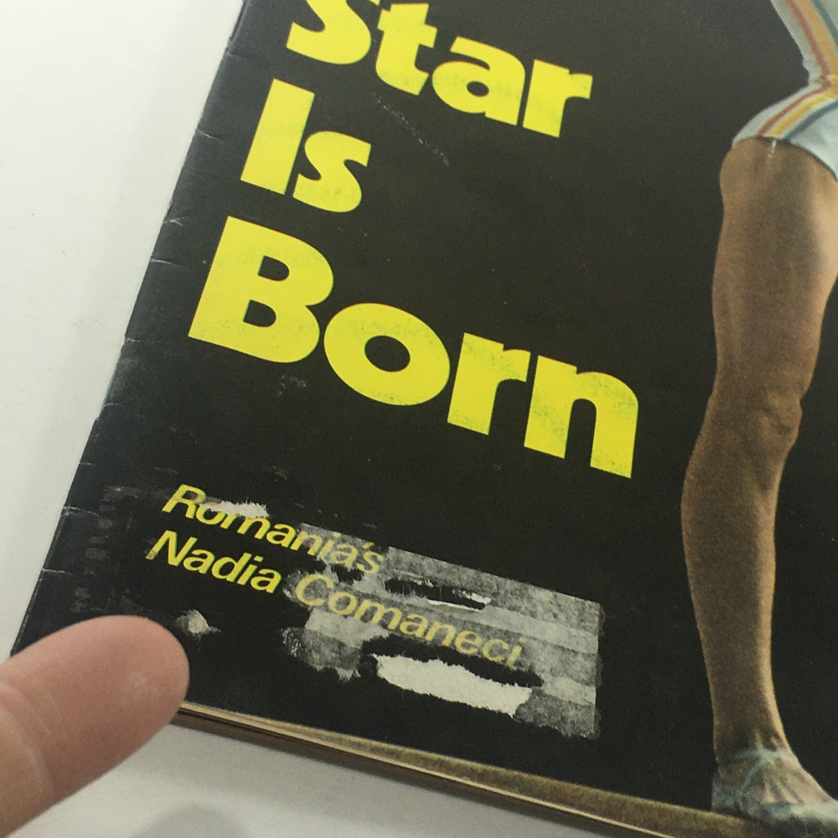 Close-up of the cover text from VTG Newsweek Magazine, August 2, 1976, highlighting 'A Star Is Born' and 'Romania's Nadia Comaneci'.