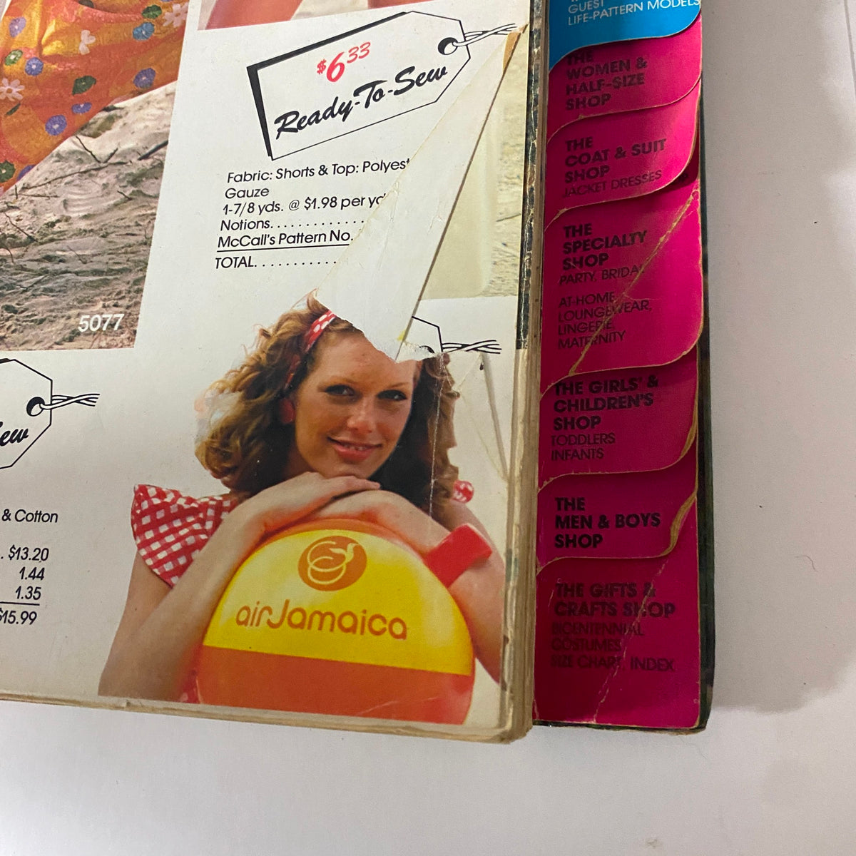 Back cover of the 1975 July-August Carefree Patterns McCall's Catalog showing a model with a beach ball, featuring a casual summer outfit and details of price tags for sewing patterns.