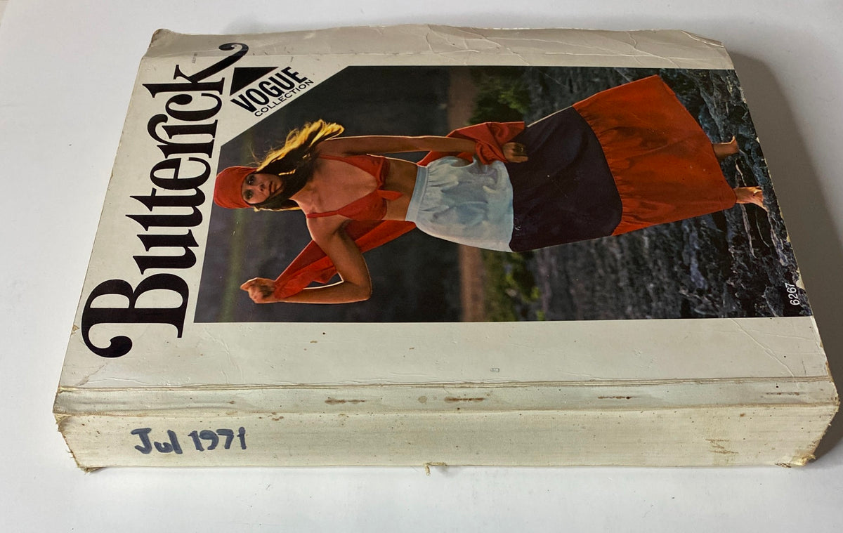 1971 July Butterick Vogue Collection Catalog displayed showcasing a vintage-style model in a colorful outfit, emphasizing the era's designer fashion trends.