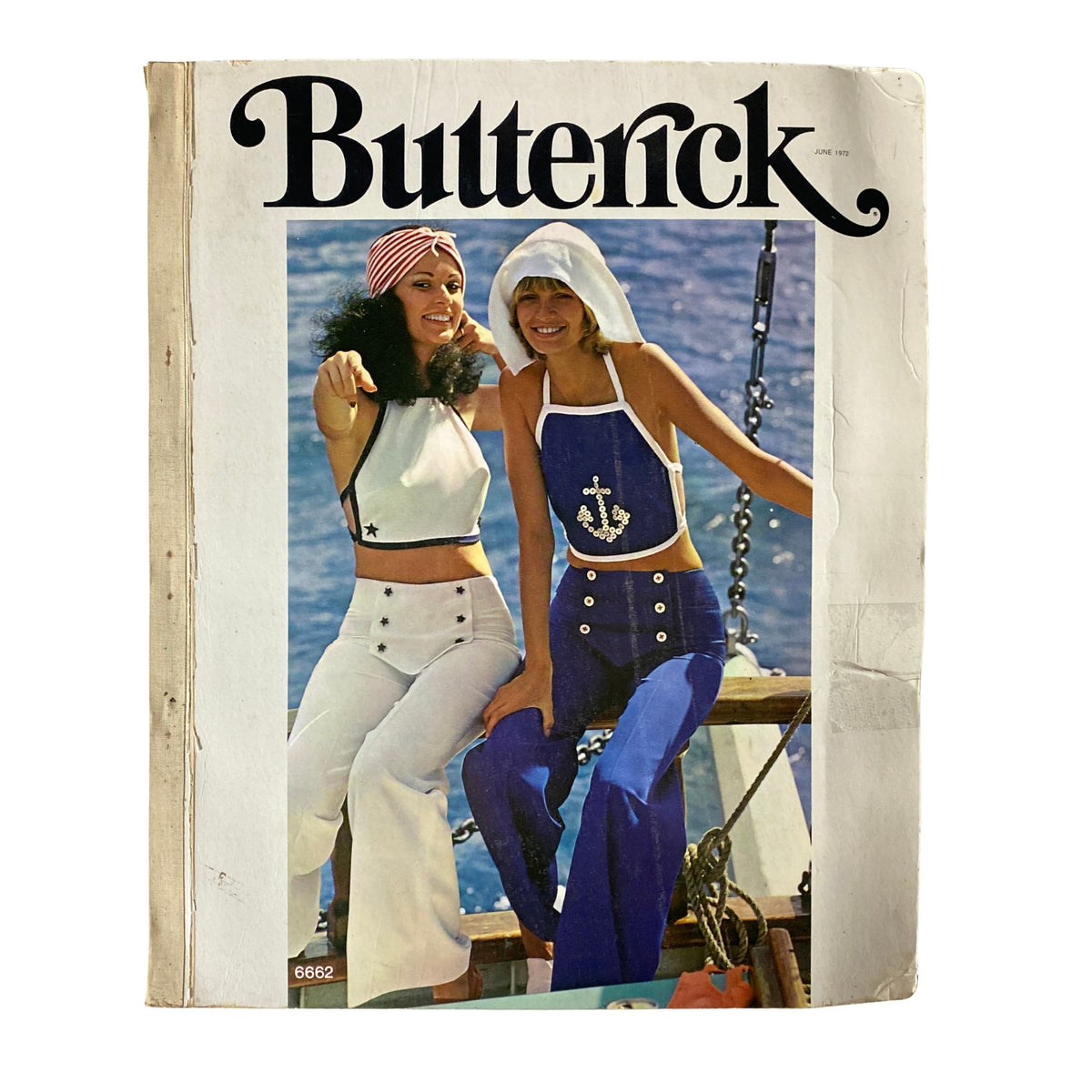 Cover of the 1972 June Butterick Miss Petite Catalog featuring two women modeling stylish summer outfits on a boat. The catalog showcases proportioned sewing patterns for petite sizes, combining vintage fashion with tailor-made designs.