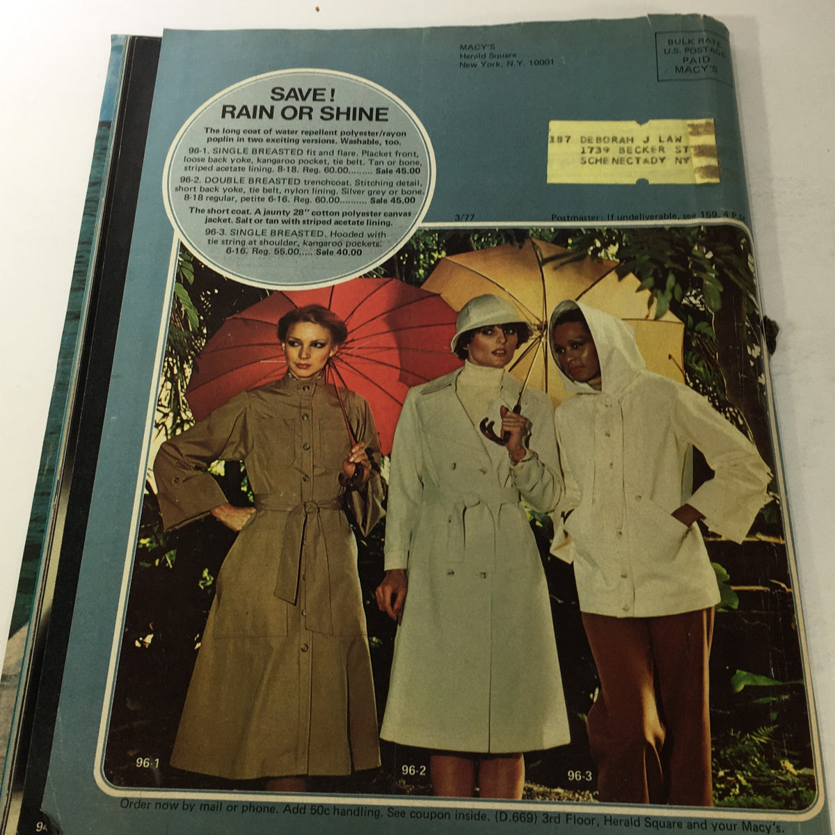 VTG Macy's Spring Sale Store Catalog: March 1977 - A fashion advertisement featuring models in stylish raincoats, emphasizing the category 'Save! Rain or Shine'.