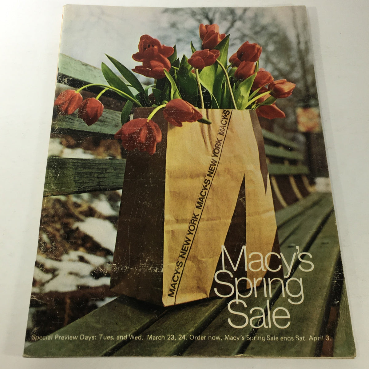 VTG Macy's Spring Sale Store Catalog from March 1976 featuring a stylish bag of tulips against a rustic background.