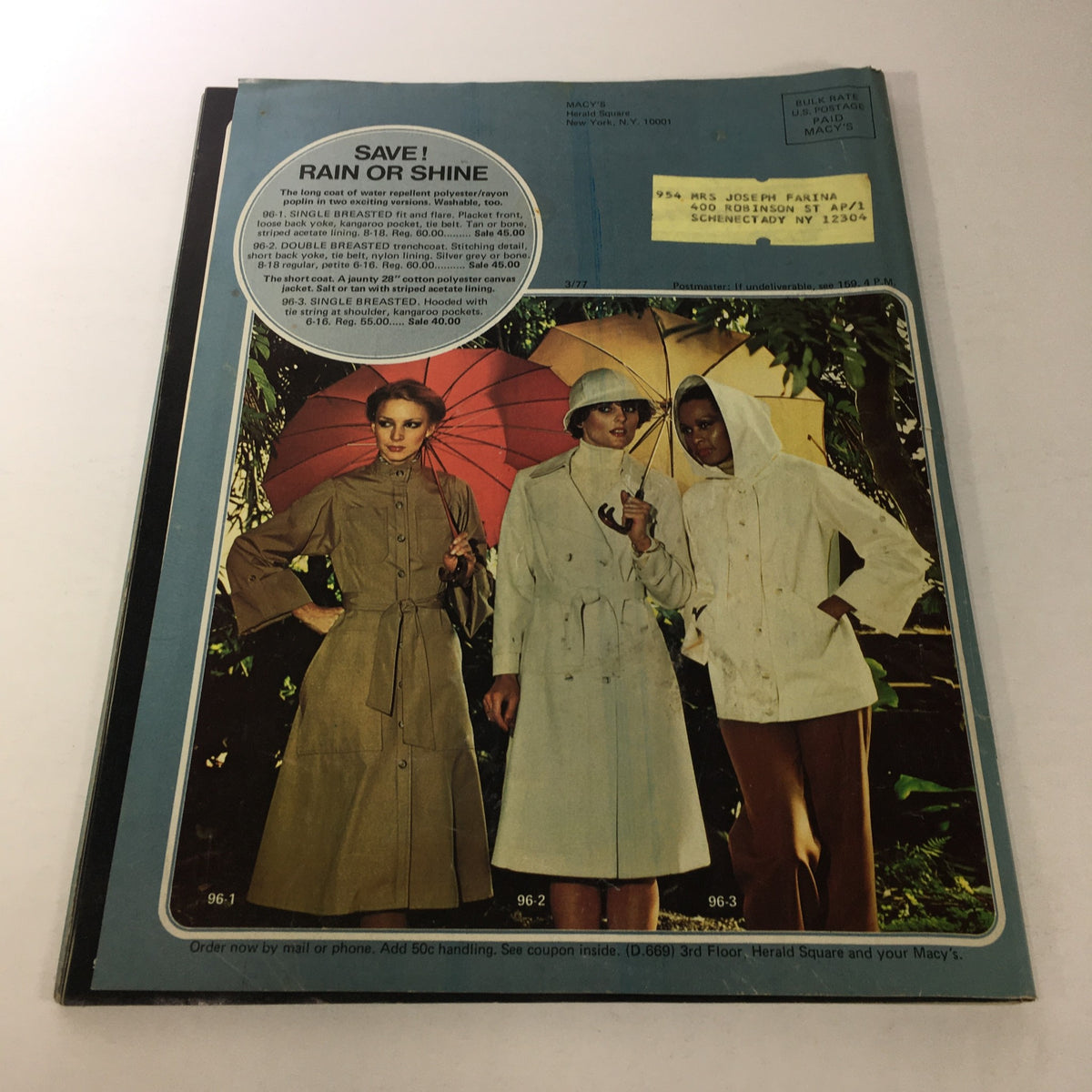 VTG Macy's Spring Sale Store Catalog: March 1977 featuring stylish raincoats modeled by women under colorful umbrellas.