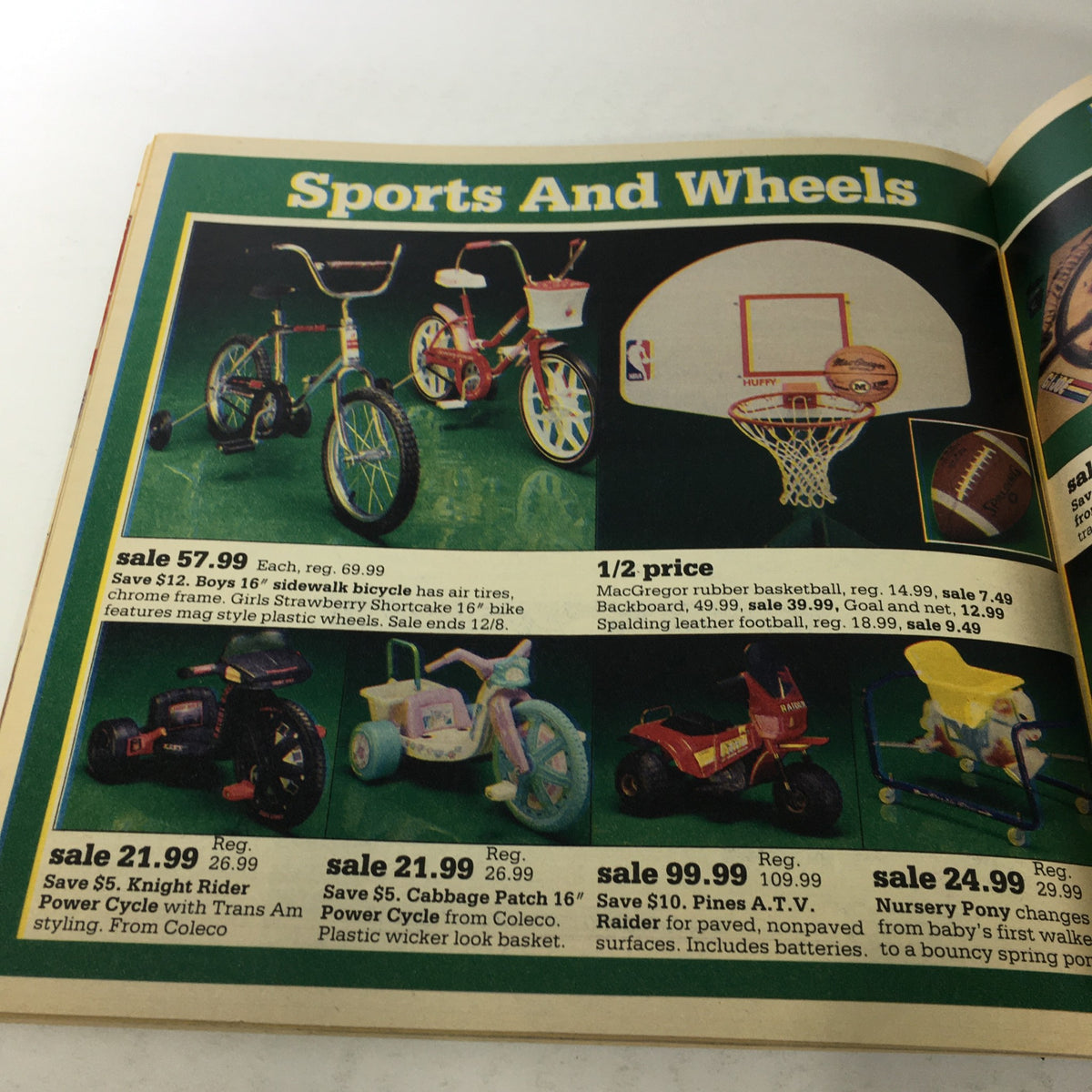 VTG Montgomery Ward Store Catalog: December 1984 featuring sports and wheels section with children's bicycles and accessories, perfect for holiday shopping.