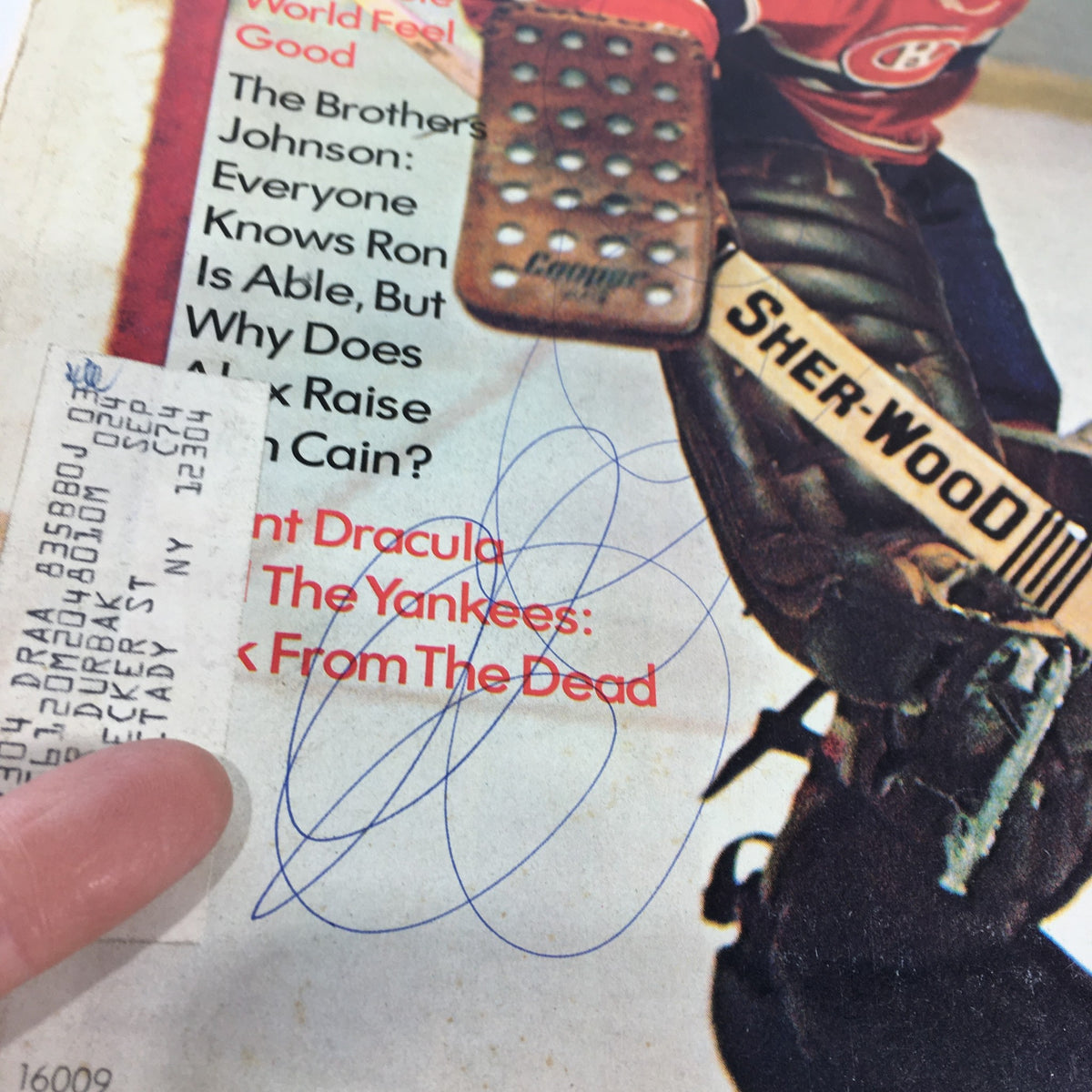 Close-up view of the Vintage Sport Magazine March 1973 cover, highlighting details like the title, Nate Archibald, and other featured articles.