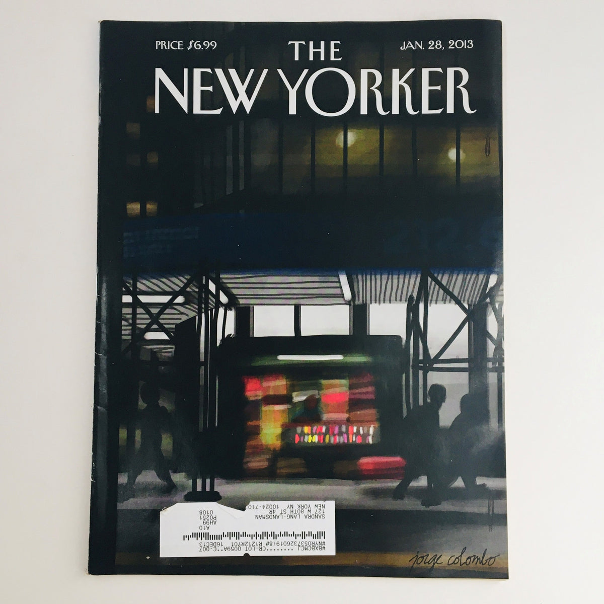 Cover of The New Yorker January 28, 2013 featuring a vibrant street scene illustrated by Jorge Colombo. The cover showcases an urban theme with artistic elements, perfect for collectors.