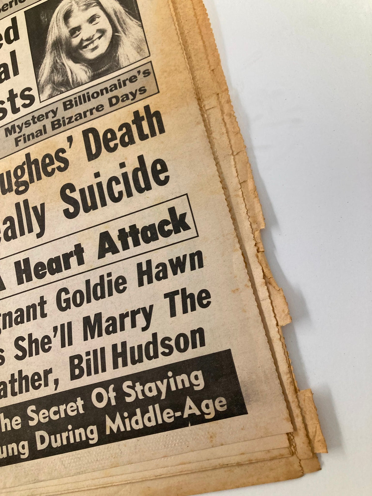 Midnight Tabloid May 24, 1976 Vol 22 No 48 featuring an article about Goldie Hawn and Bill Hudson, showcasing vintage magazine layout with prominent headlines and yellowed paper.