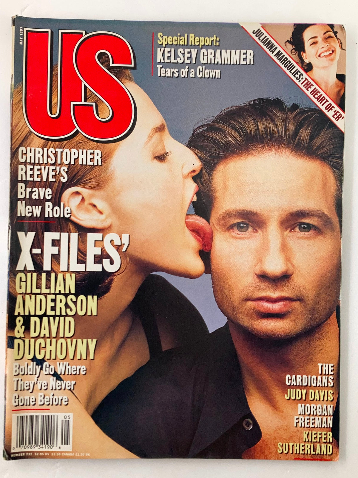 US Magazine May 1997 featuring The X-Files' Gillian Anderson and David Duchovny on the cover, highlighting their iconic roles and dynamic from the popular television series.