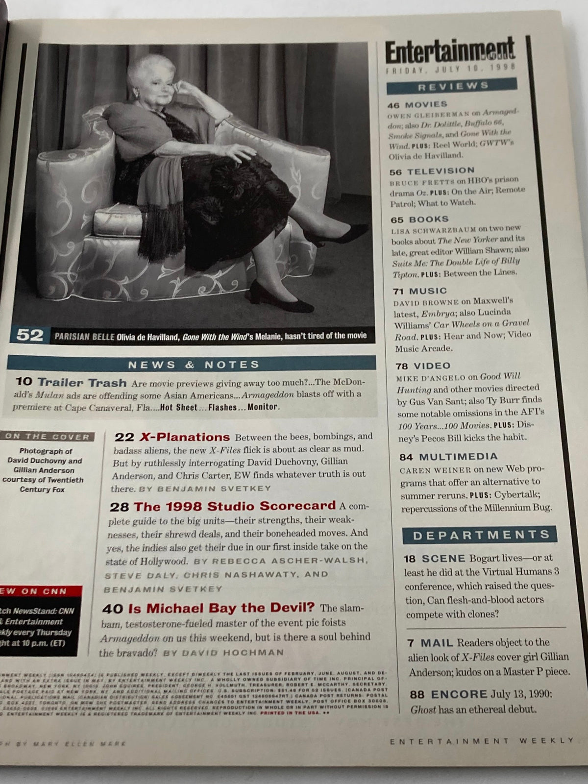 Interior page from Entertainment Weekly magazine dated July 10, 1998, highlighting reviews and articles with a black and white image of actress Olivia de Havilland, showcasing insights into the entertainment industry of the late 90s.