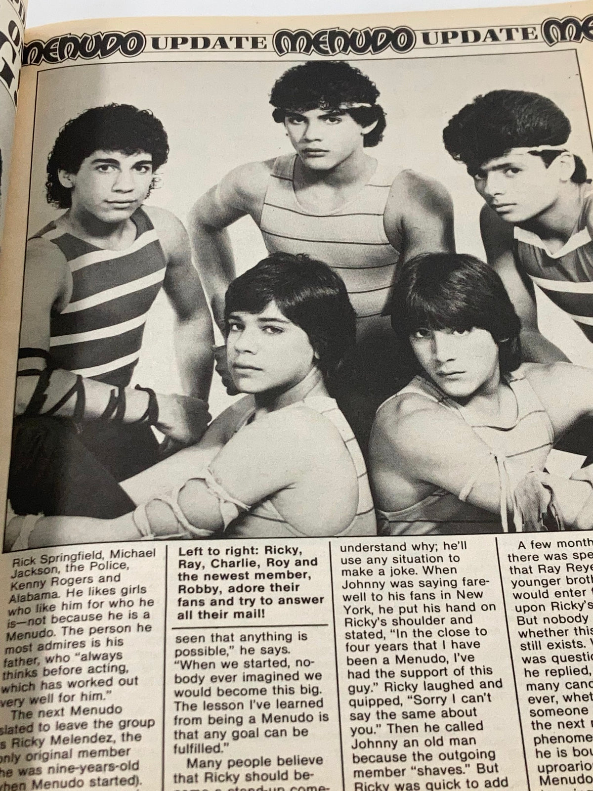 Menudo band members prominently featured in Stars & Rockers Magazine 1984 Vol 1 #1, discussing their popularity and fan engagement.