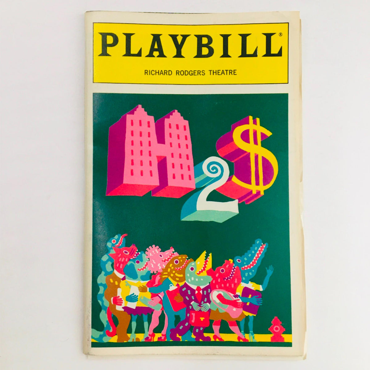 Cover of the 1995 Playbill for 'How To Succeed In Business Without Really Trying' directed by Des McAnuff, featuring colorful artwork and the title prominently displayed.