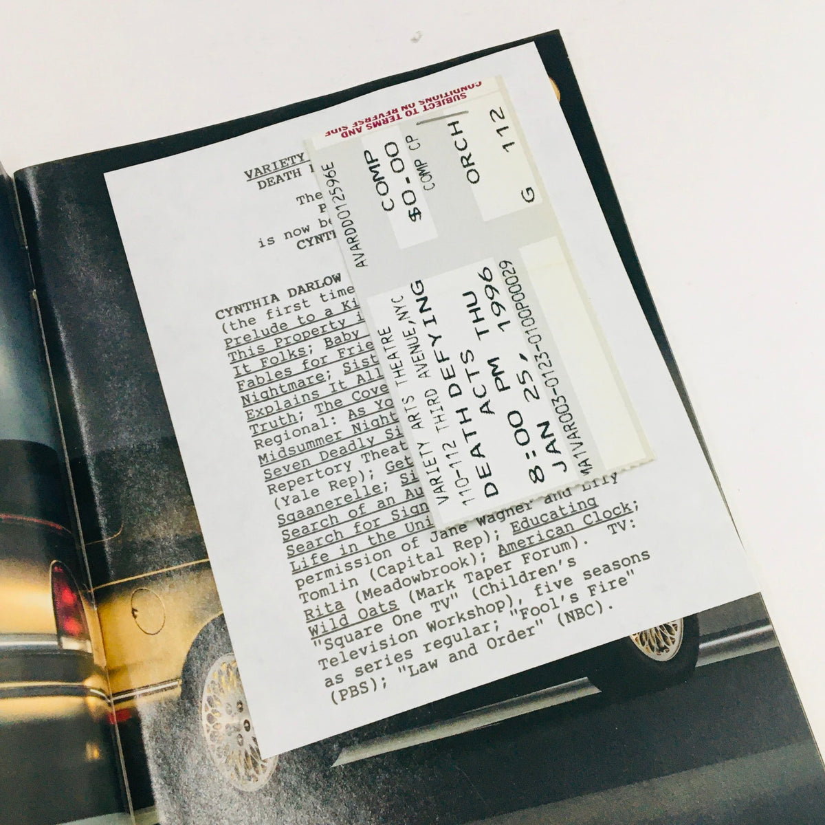 Inside the 1995 Playbill for Death Defying Acts, showcasing original ticket stubs for the performance at Variety Arts Theatre.