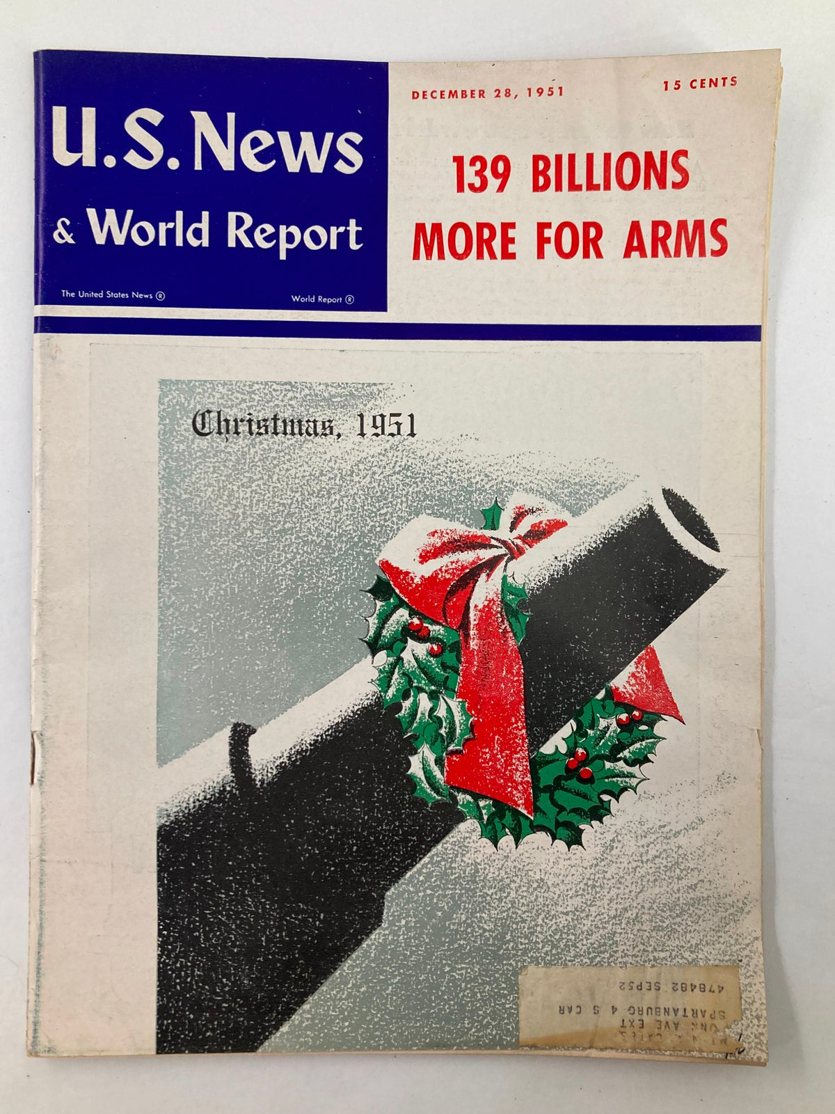 Cover of US News & World Report December 28, 1951, featuring the headline '139 Billions More For Arms' and an illustration of a cannon adorned with a Christmas wreath.