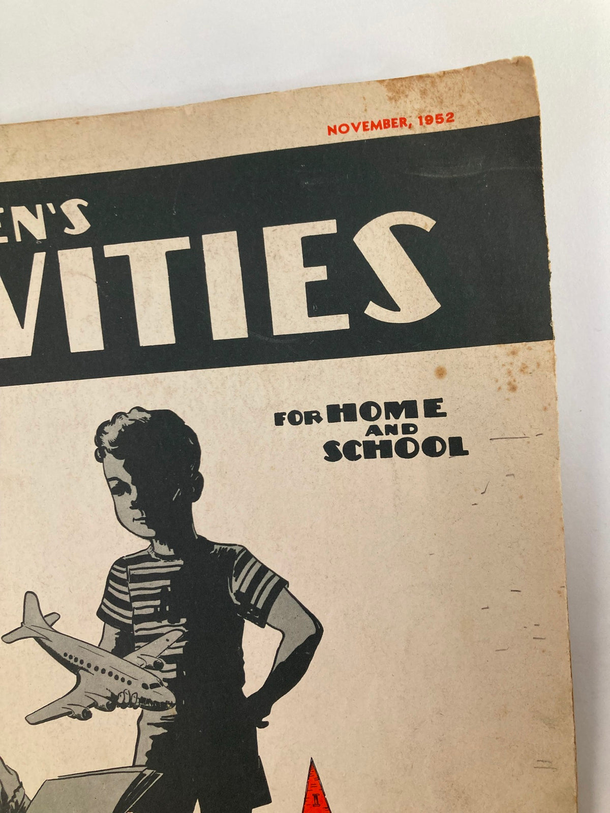 Close-up of the 'Children's Activities Magazine' title and publication date of November 1952, showcasing its vintage design.