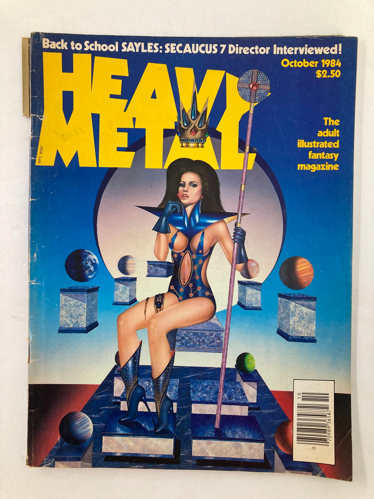 Front cover of VTG Heavy Metal Magazine October 1984 Vol 8 #7 featuring a striking illustration with a woman in a fantasy setting surrounded by planets and geometrical shapes.