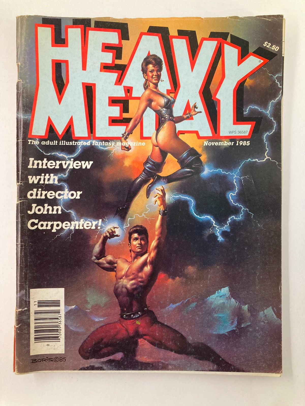 Cover of VTG Heavy Metal Magazine November 1985 Vol 9 #8 featuring 'The Jealous God' with dramatic artwork and an interview with John Carpenter.
