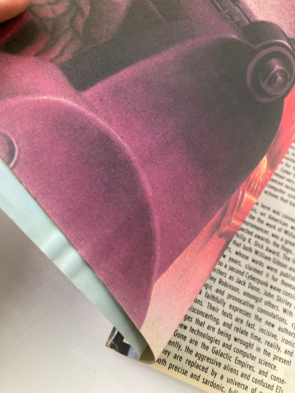 Interior detail of VTG Heavy Metal Magazine Winter 1987, highlighting a colorful illustration and text sections, reflecting the magazine's unique blend of science fiction and fantasy.
