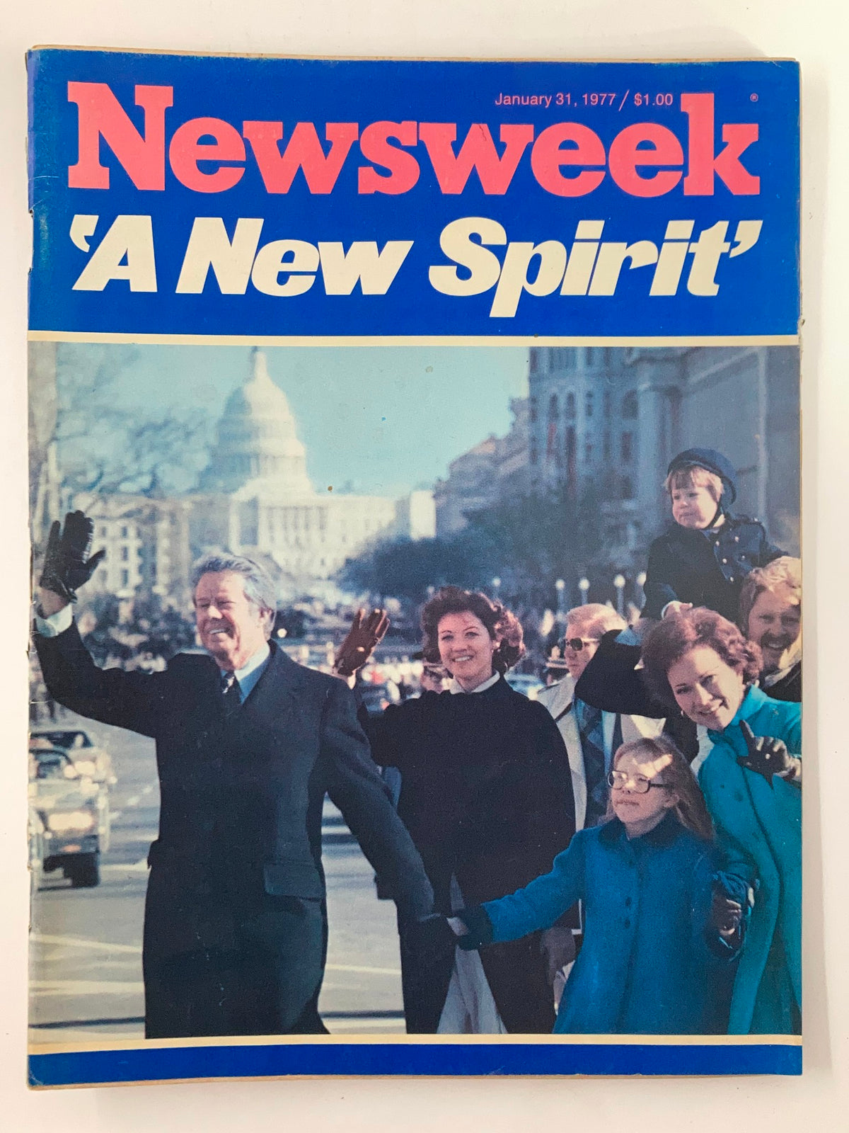 Cover of the vintage Newsweek magazine from January 31, 1977, featuring the title 'A New Spirit', depicting President Jimmy Carter and a crowd waving, capturing a moment from the late 1970s.
