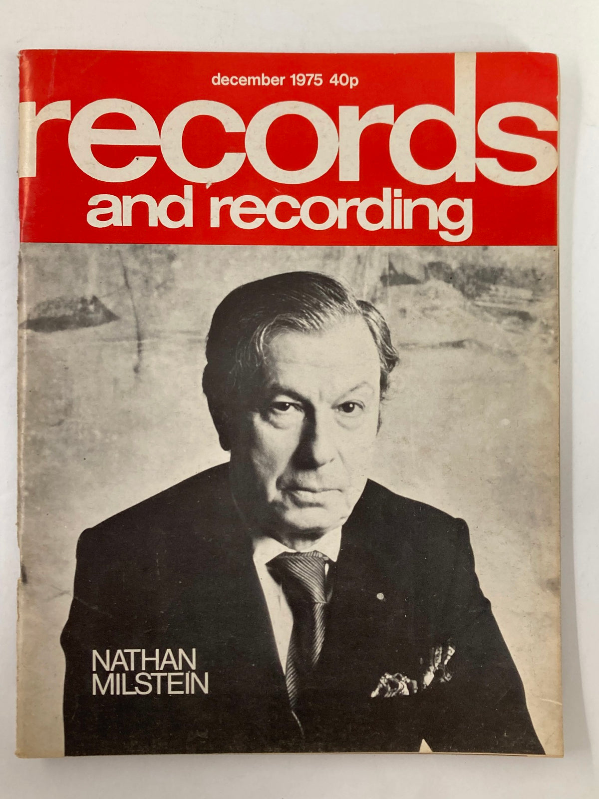 Cover of VTG Records & Recordings Magazine December 1975 featuring Nathan Milstein, showcasing a classic design with a red background and vintage typography.