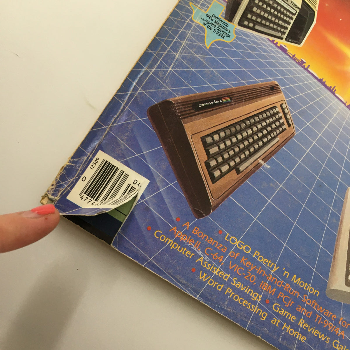 Close-up of the spine of Home Computer Magazine Vol. 4 No. 1 with a visible price tag and barcode, highlighting the vintage condition and collectible nature of the magazine.