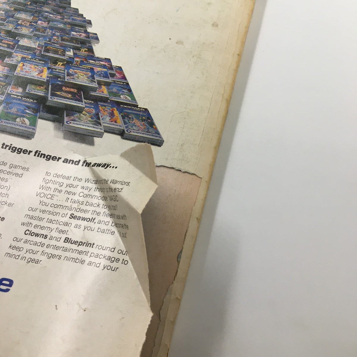 Back cover of Home Computer Magazine Vol. 4 No. 1 showing vintage video game covers and a worn edge characteristic of classic magazines.