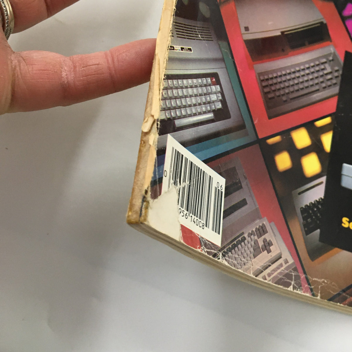 Condition details of VTG Family Computing Magazine June 1984, highlighting wear along the binding and barcode.