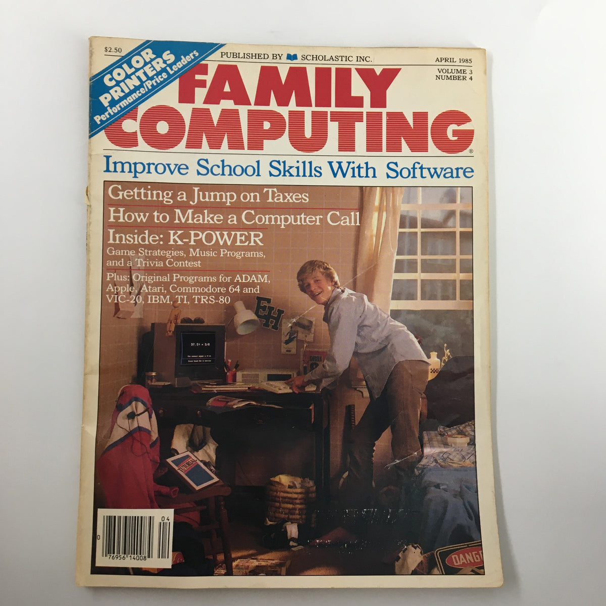 Cover of the VTG Family Computing Magazine April 1985 featuring the headline 'How To Make A Computer Call'. The cover displays a boy interacting with a computer in a cozy room filled with school materials, reflecting the early days of personal computing.
