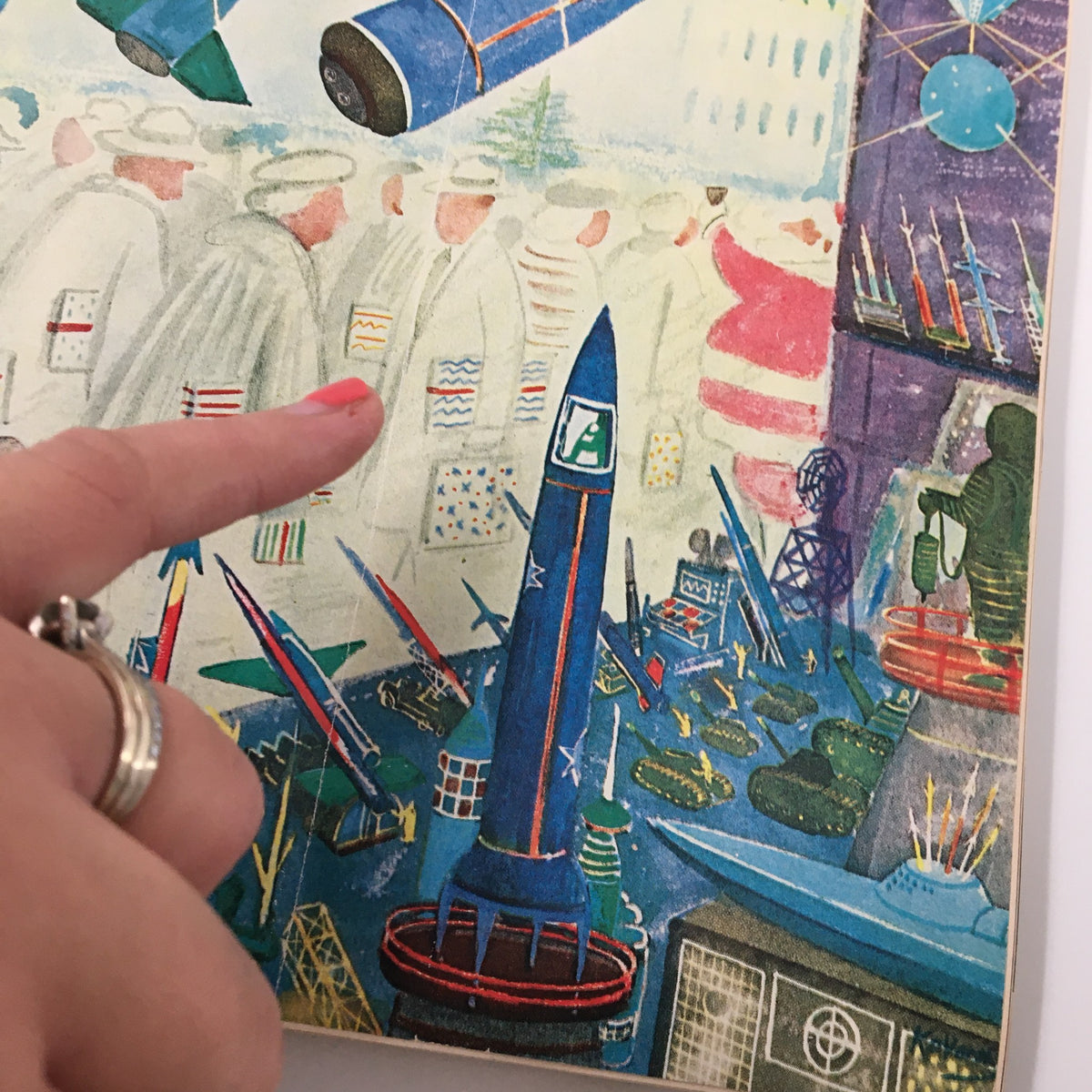 Close-up of The New Yorker magazine cover from December 9, 1961, highlighting the detailed illustration Rocketeers by Ilonka Karasz with rockets and figures.