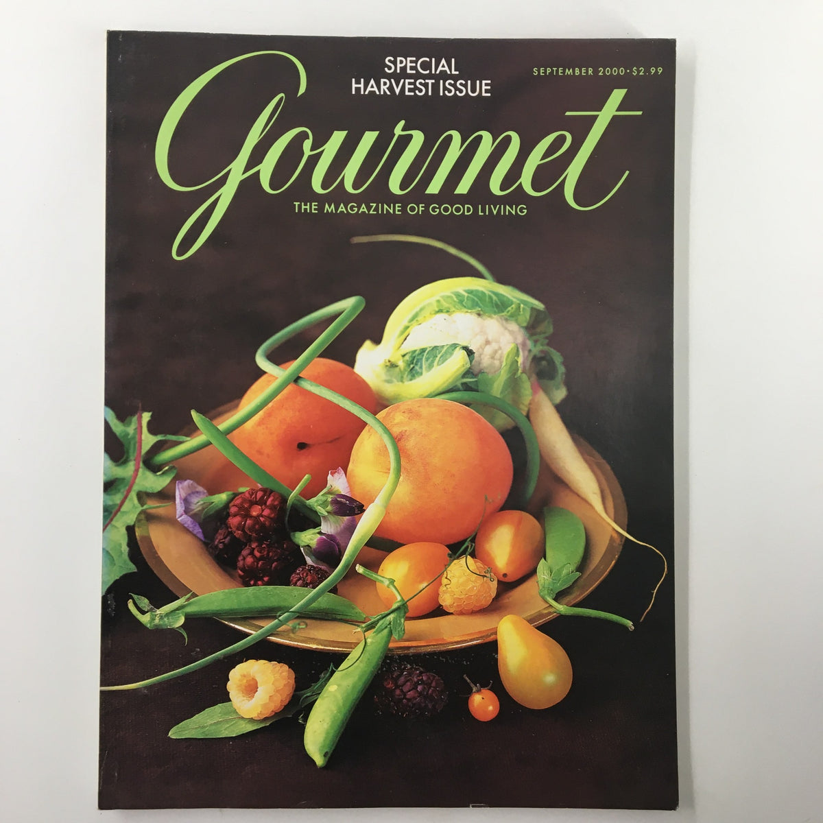 Gourmet Magazine September 2000 cover featuring a vibrant arrangement of seasonal fruits and vegetables, celebrating the issue's theme, 'Celebrating The Bounty of America.' This special harvest issue highlights culinary delights.