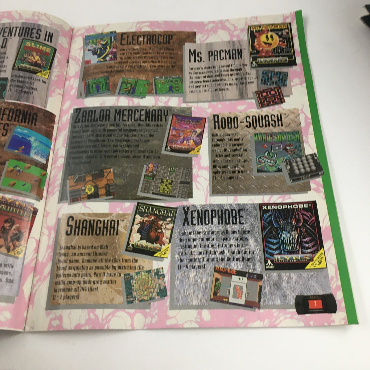 Another inside spread of the Atari Lynx Magazine 1992 Grey Matters Vol 3 displaying various game reviews, including titles like Ms. Pacman and Xenophobe, highlighting the gaming culture of the early 90s.