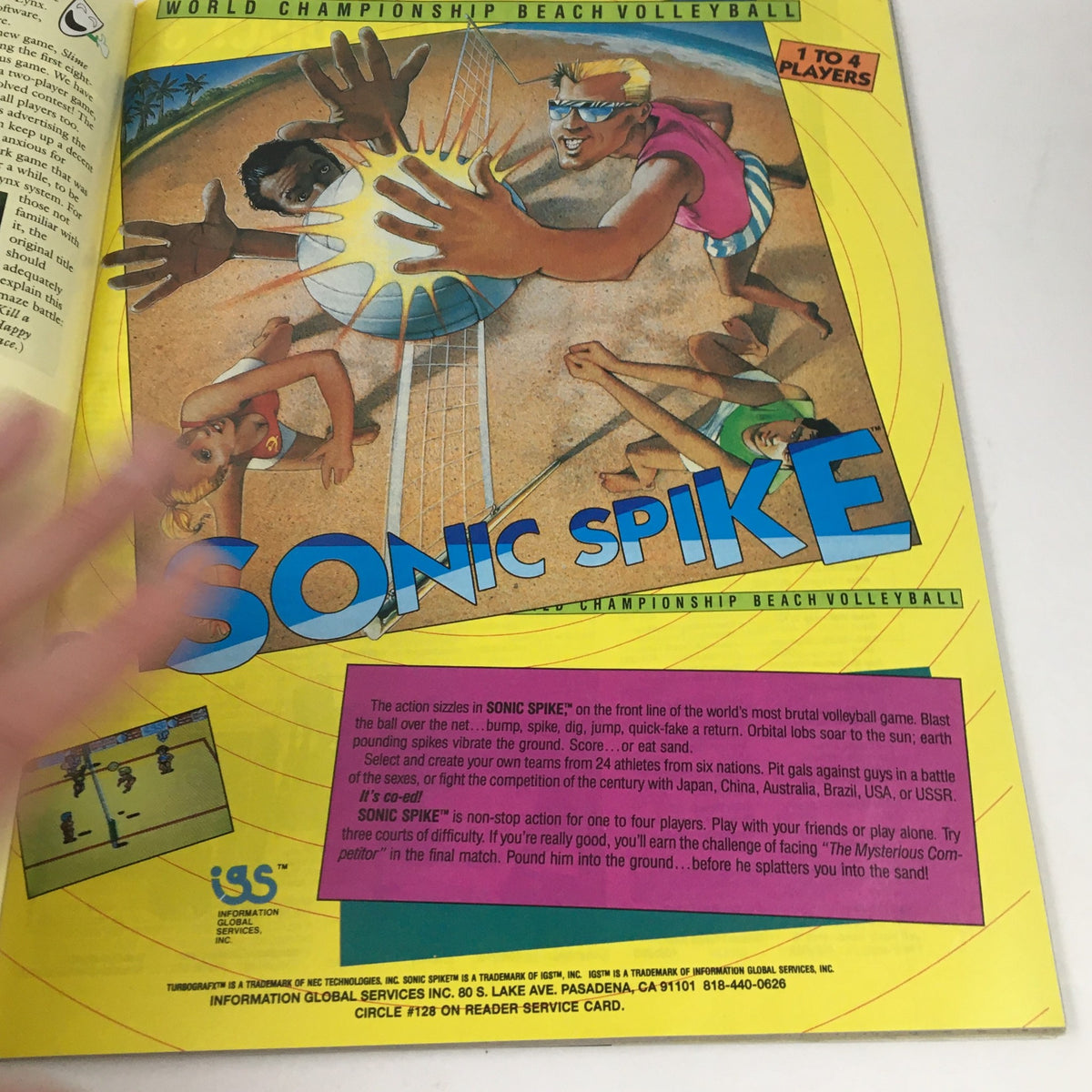 Advertisement for Sonic Spike in Video Games & Computer Entertainment Magazine September 1990, displaying action-packed beach volleyball gameplay.
