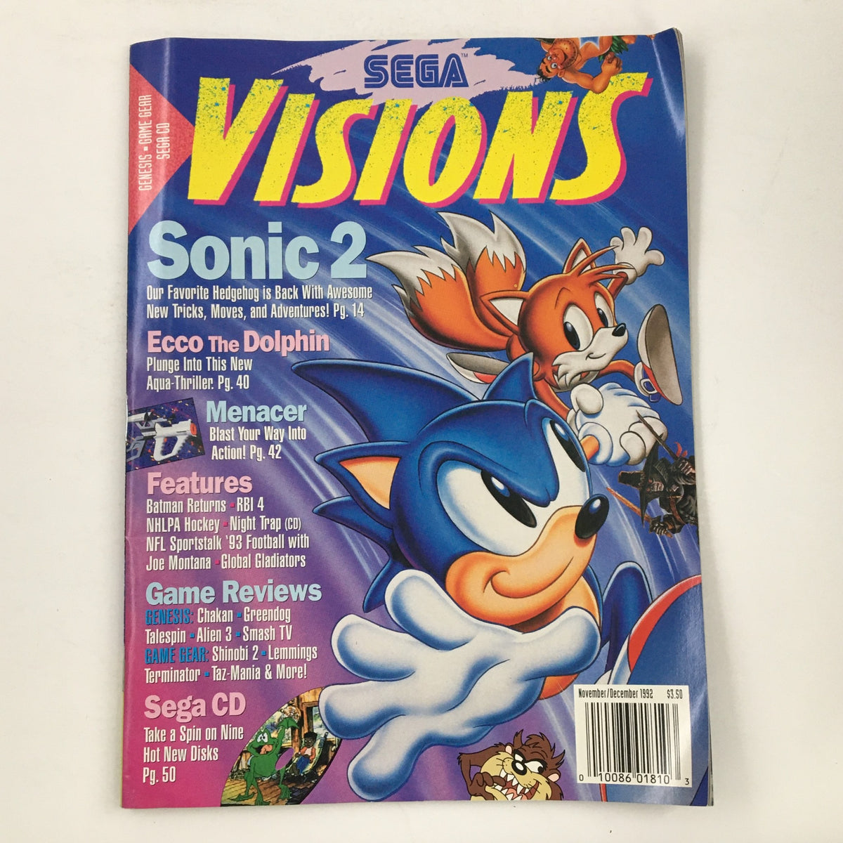 Sega Visions Magazine November 1992 cover featuring Sonic 2, Ecco The Dolphin, and Menacer. A vibrant showcase of early 90s gaming culture.