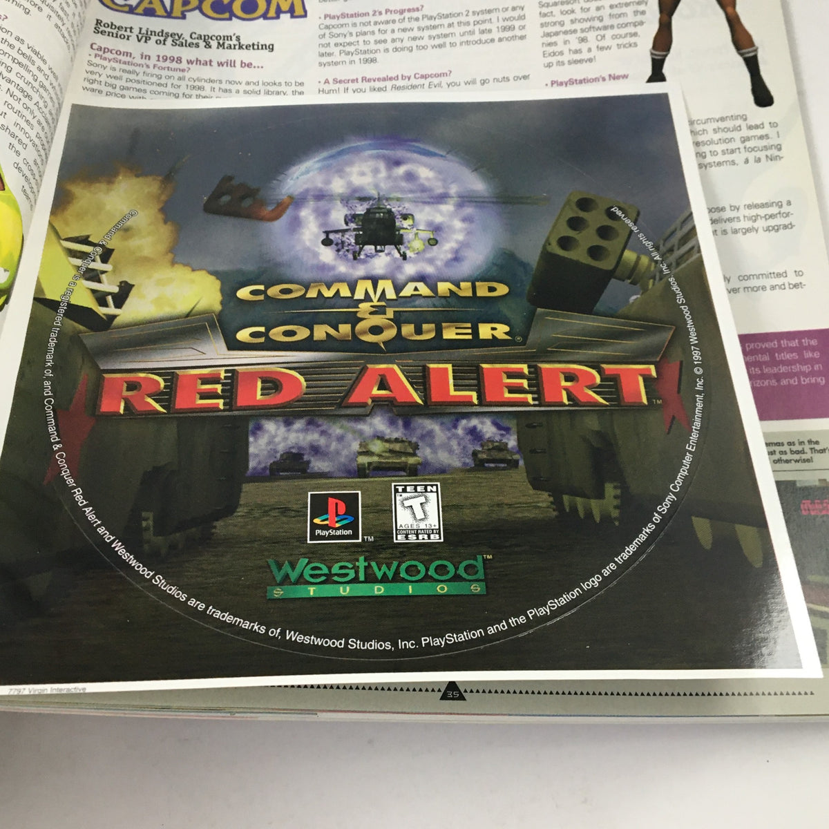 PlayStation Magazine January 1998 Vol 2 #1 featuring the advertisement for Command & Conquer: Red Alert by Westwood Studios.
