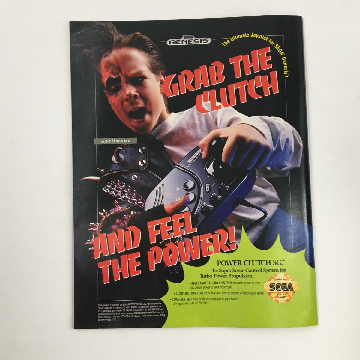 Promotional image for Sega Visions Magazine May 1992 featuring a child excitedly holding the Power Clutch SG joystick, with the text 'Grab The Clutch and Feel The Power!' highlighting the gaming accessory.