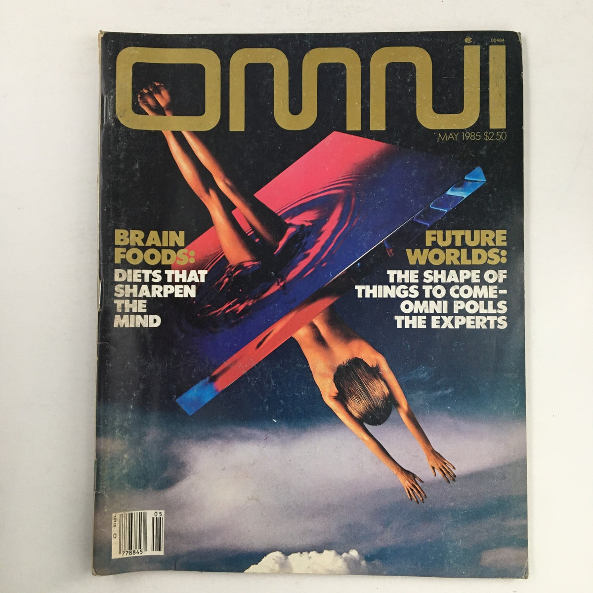 Cover of Omni Magazine May 1985 featuring the title 'Brain Foods: Diets That Sharpen the Mind' and 'Future Worlds: The Shape of Things to Come'. The cover showcases an artistic design with vibrant colors and imagery.