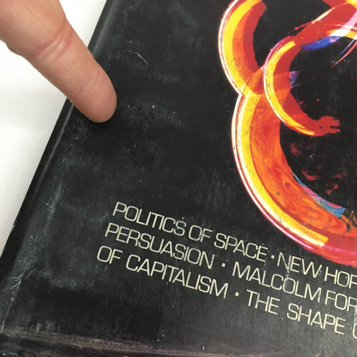 Close-up of the Omni Magazine February 1981 cover showing details on the topics of Politics of Space, subliminal persuasion, and capitalism.