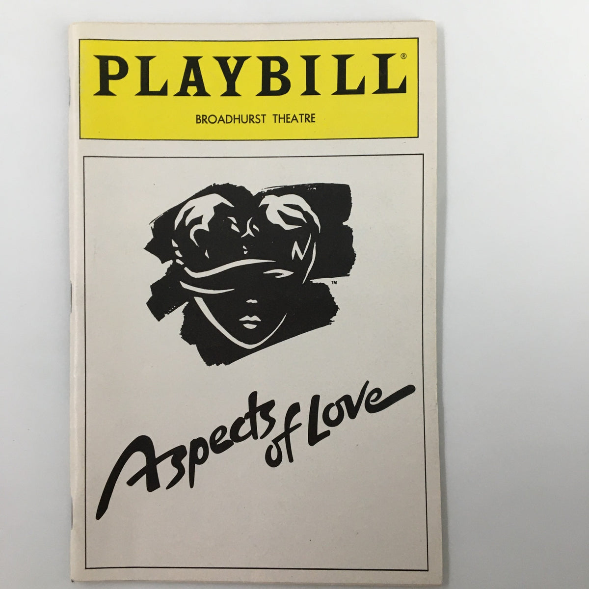 1990 Playbill for the musical Aspects of Love at Broadhurst Theatre featuring a graphic cover design.