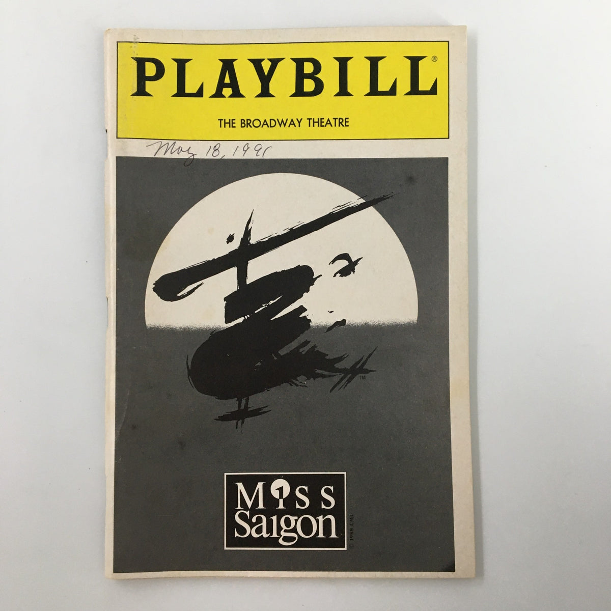 1991 Playbill from The Broadway Theatre featuring Miss Saigon, showcasing a helicopter graphic on the cover, dated May 18, 1991.